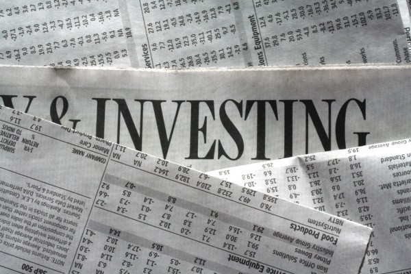 Заголовок об инвестициях в газете